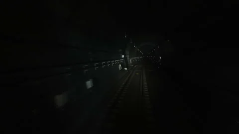 Dark Subway Tunnel Interior with Curved Track in Seoul Stock Footage 340242041