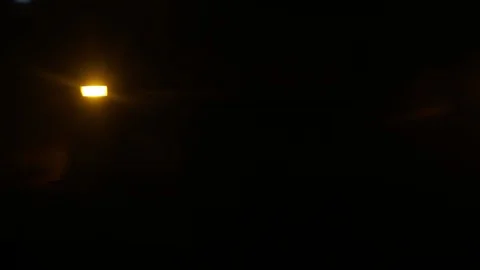 Dark subway tunnel lights passing by, lookng out window, NYC Stock Footage 99041583