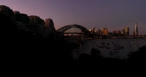 Dark sunrise time in Lavender bay on Sydney Harbour to city CBD landmarks. Stock Footage 135307053