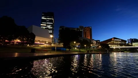 Dark sunset over Adelaide city waterfront in time lapse panorama as 4k on river. Stock Footage 270921960