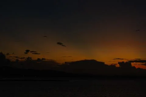 Dark Sunset Over the Ocean 스톡 사진