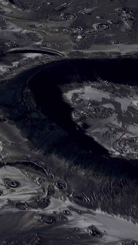 Dark surface with circular features and textures observed on another planet Stock Footage 344958068