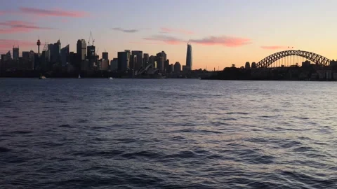 Dark Sydney city time lapse over Harbour to CBD waterfront in 4k. Stock Footage 136413378