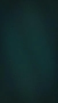 Dark teal textured grainy vertical background with subtle gradient and blur.. Stock Photos