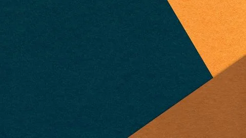 Dark teal textured paper background with orange brown triangular corners an.. Illustrazione stock