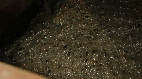 Dark technological squishy liquid bubbling Stock Footage 52856036