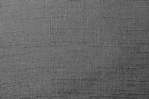 Dark texture of rough fabric with a pattern of lines. Textile close-up abstra Stock Photos