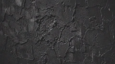 Dark textured background with rough surface. Fotos Stock