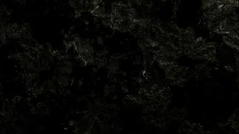 Dark textured fabric background with torn threads reveals moody abstract blac Stock Photos