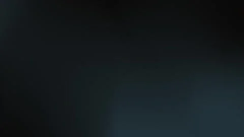 Dark textured gradient with subtle shadow blend, seamless loop background. 4K. Stock Footage 300840116