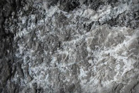 Dark textured stone surface Stock Photos