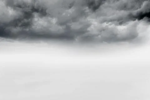 Dark textured storm clouds are gathering over wide open foggy plain in flat Stock Illustration