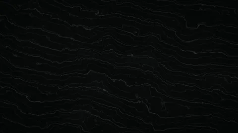 Dark textured surface displays intricate wavy natural stone veining Stock Footage 340831264