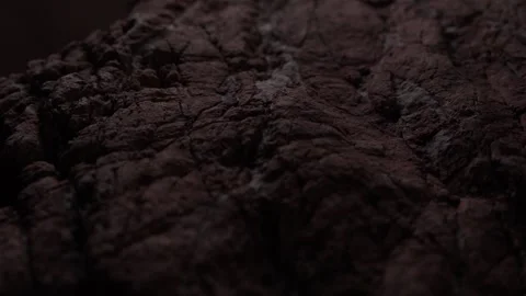 Dark textured surface of a red rock. Stock Footage 289549230