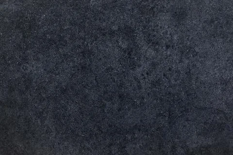 Dark textured surface with a subtle pattern creating a modern and elegant 스톡 사진