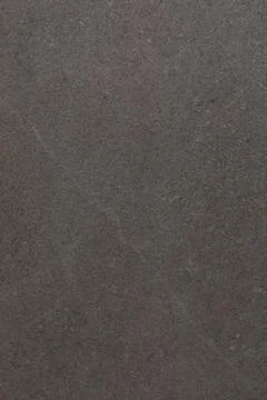 Dark textured surface with subtle patterns and details providing a unique Stock Photos