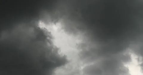 Dark thick storm clouds ready to down pour rain looking straight up Stock Footage 202379938