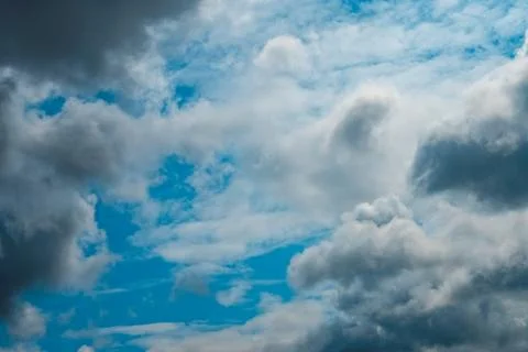 Dark thunder clouds covered autumn sky. Stock Photos