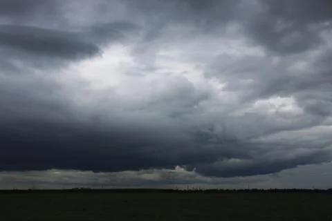 Dark thunder clouds before the storm Stock Photos