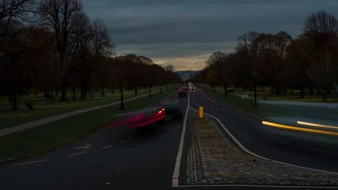 Dark time lapse of 2 way traffic, looking down a perfectly straight road Stock Footage 142850391