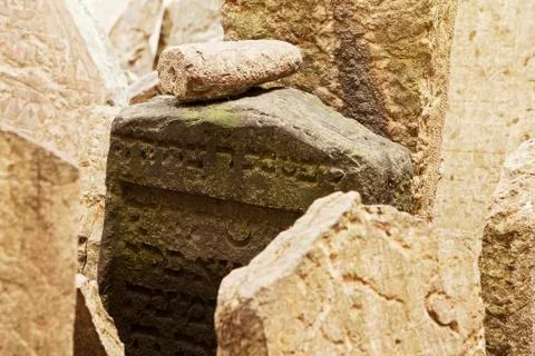 Dark tombstone with small stone Stock Photos