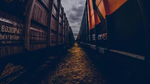 Dark trail between wagons Stock Photos