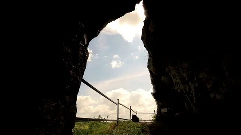 Dark tunnel leading into the light Stock Footage 70153863