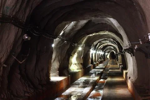 Dark tunnel with light Stock Photos