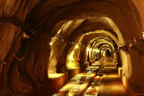 Dark tunnel with light Stock Photos