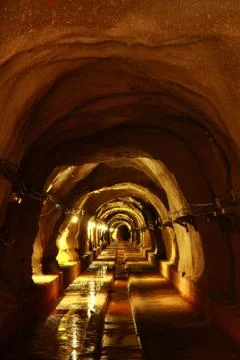 Dark tunnel with light Stock Photos