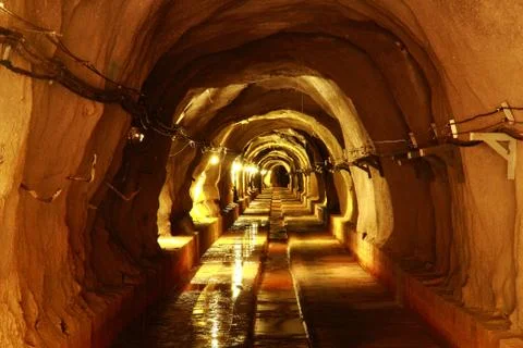 Dark tunnel with light Stock Photos