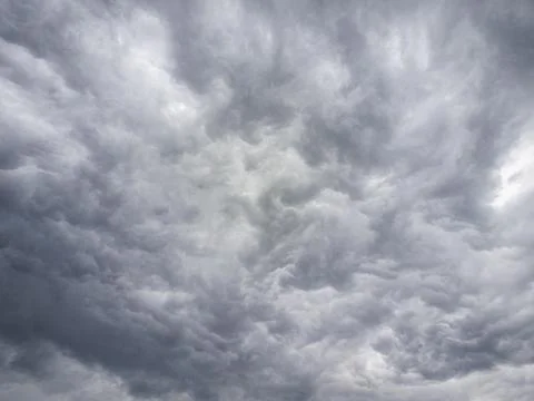 Dark Turbulent Clouds Symbolizing Uncertainty 写真素材