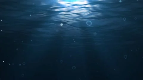 Dark Underwater with light ray and bubble particle floating background Stock Footage 322911260
