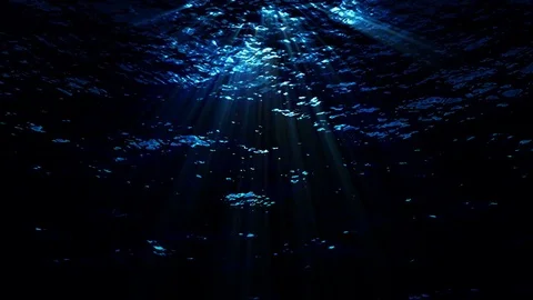 Dark underwater ocean waves ripple and flow with light rays - HD Stock Footage Stock Footage