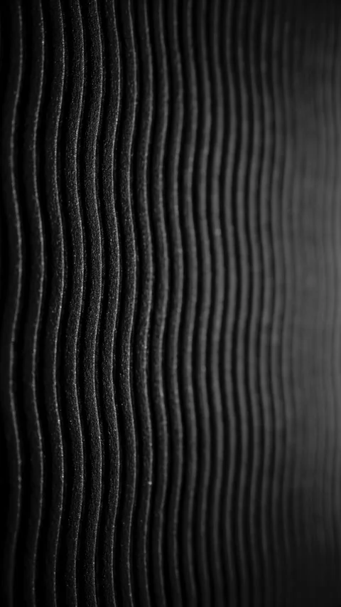 Dark vertical wavy lines form a flowing monochrome texture Stock Footage 344970109