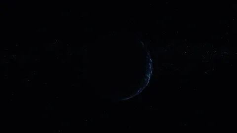 A dark view of the Earth lit by a thin blue crescent in deep space with a s.. Vidéo 337080322