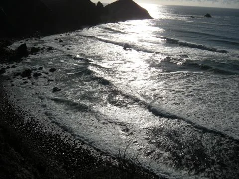 Dark view of waves from a cliff 写真素材