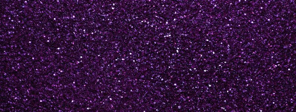 Dark violet sparkling background from small sequins, macro. Purple backdrop Stock Photos