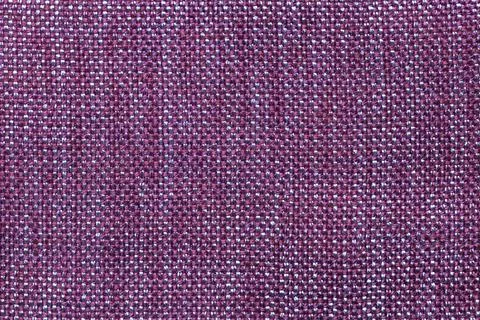 Dark violet textile background with checkered pattern. Structure of fabric ma Stock Photos