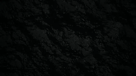 A dark viscous liquid surface undulates in a seamless loop Stock Footage 340956942