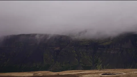 Dark Volcanic Mountain Cliffs in Fog Iceland Stock Footage 319697703