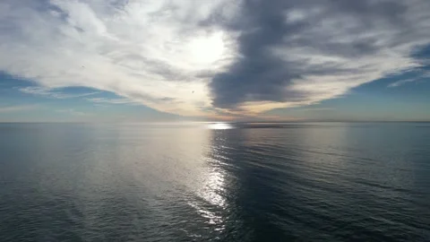 Dark vs Light reflection in the sea from the sky Stock Footage 232769921