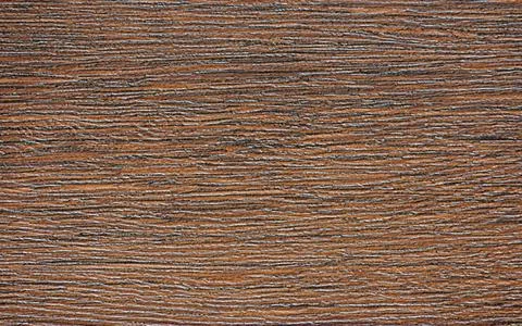 Dark walnut, polished flat surface of natural brown wood close-up. Stock Photos