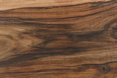 Dark walnut wood grain texture in a horizontal full frame background Stock Photos