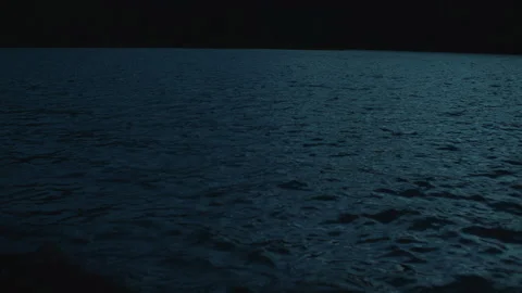 Dark Water - A Calm Mountain Lake at Night Stock Footage 232340929