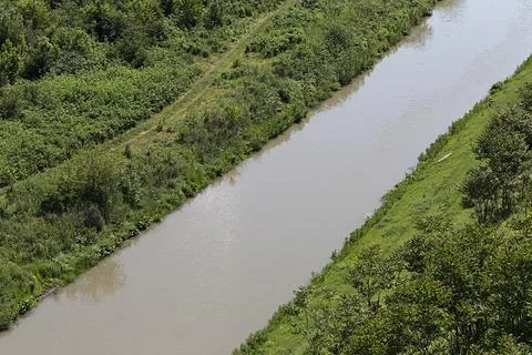 Dark water of the river. Stock Photos