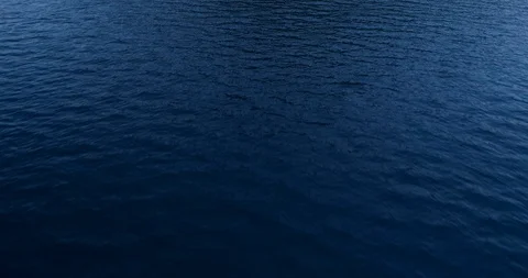 Dark water surface aerial view Stockbeeldmateriaal 124349779
