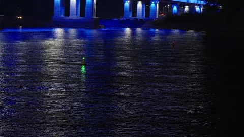 Dark water surface at night reflecting city and buoy lights. Stock Footage 342371923