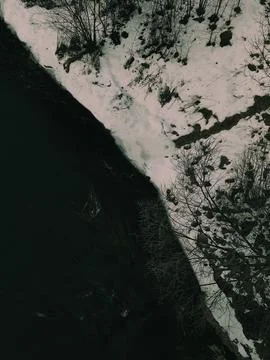 Dark waters in the river in winter Stock Photos