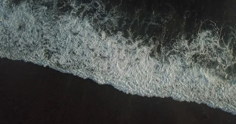 Dark waves crashing on drone Stock Footage